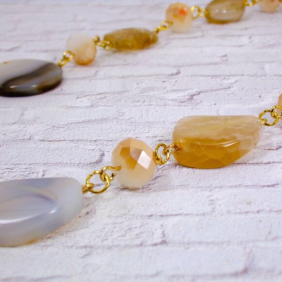 A mix of beige, brown, and off white bead necklace with glass and stone - Picture 3 of 13